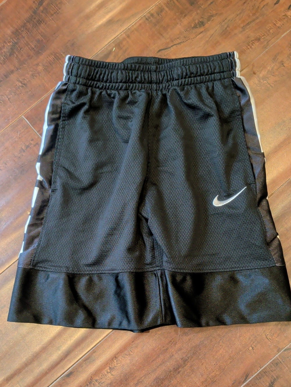Nike Black Kids' Mesh Athletic Shorts with White Swoosh